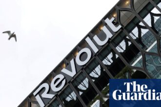 A bird flies past Revolut global headquarters