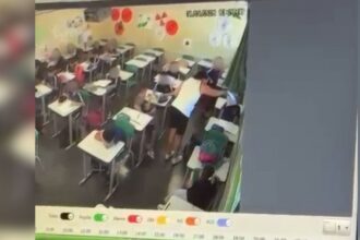 Fachada de escola pública e viatura policial em Belo Horizonte