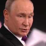 Vladimir Putin durante pronunciamento a jornalistas