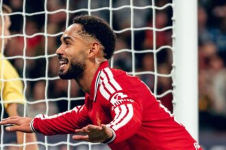 Matheus Cunha durante jogo do Manchester United na Champions League